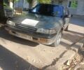 Серый Тойота Карина, объемом двигателя 2 л и пробегом 380 тыс. км за 1300 $, фото 7 на Automoto.ua