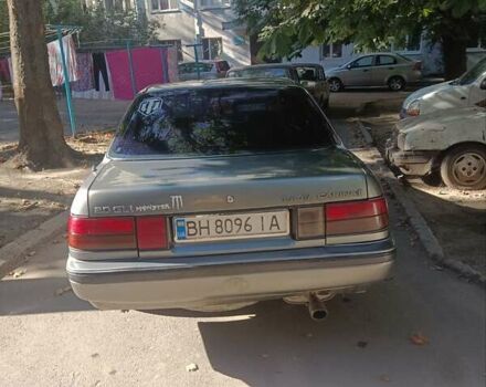 Серый Тойота Карина, объемом двигателя 2 л и пробегом 380 тыс. км за 1300 $, фото 1 на Automoto.ua