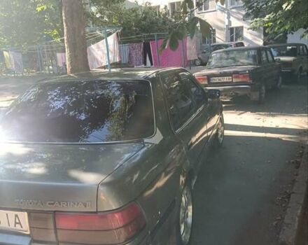 Серый Тойота Карина, объемом двигателя 2 л и пробегом 380 тыс. км за 1300 $, фото 3 на Automoto.ua