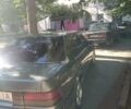 Серый Тойота Карина, объемом двигателя 2 л и пробегом 380 тыс. км за 1300 $, фото 3 на Automoto.ua