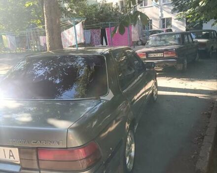 Серый Тойота Карина, объемом двигателя 2 л и пробегом 380 тыс. км за 1300 $, фото 2 на Automoto.ua