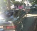 Серый Тойота Карина, объемом двигателя 2 л и пробегом 380 тыс. км за 1300 $, фото 2 на Automoto.ua