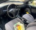 Сірий Тойота Каріна, об'ємом двигуна 1.6 л та пробігом 303 тис. км за 1800 $, фото 1 на Automoto.ua