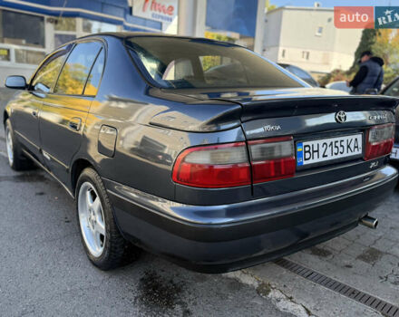 Серый Тойота Карина, объемом двигателя 1.6 л и пробегом 175 тыс. км за 2777 $, фото 7 на Automoto.ua