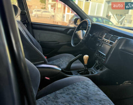 Серый Тойота Карина, объемом двигателя 1.6 л и пробегом 175 тыс. км за 2777 $, фото 10 на Automoto.ua