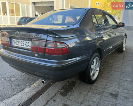 Серый Тойота Карина, объемом двигателя 1.6 л и пробегом 175 тыс. км за 2777 $, фото 3 на Automoto.ua