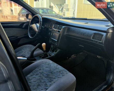 Серый Тойота Карина, объемом двигателя 1.6 л и пробегом 175 тыс. км за 2777 $, фото 11 на Automoto.ua