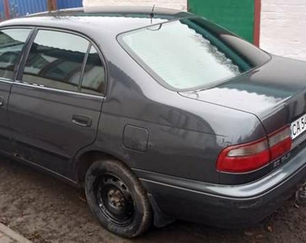 Серый Тойота Карина, объемом двигателя 2 л и пробегом 404 тыс. км за 2999 $, фото 3 на Automoto.ua