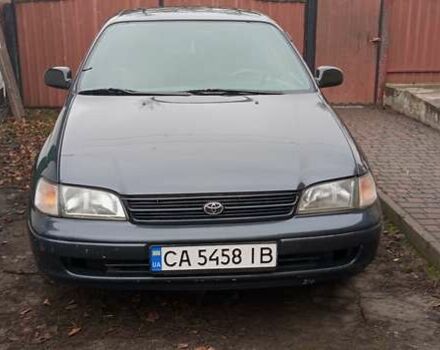 Серый Тойота Карина, объемом двигателя 2 л и пробегом 404 тыс. км за 2999 $, фото 1 на Automoto.ua