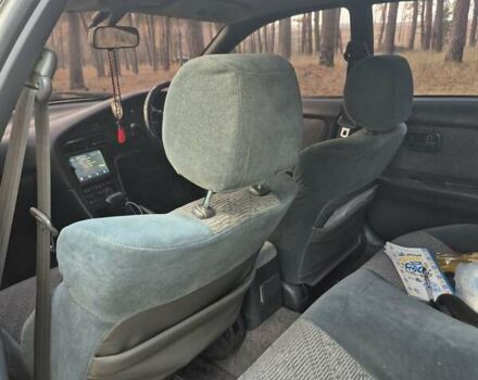 Серый Тойота Карина, объемом двигателя 2 л и пробегом 304 тыс. км за 3000 $, фото 7 на Automoto.ua