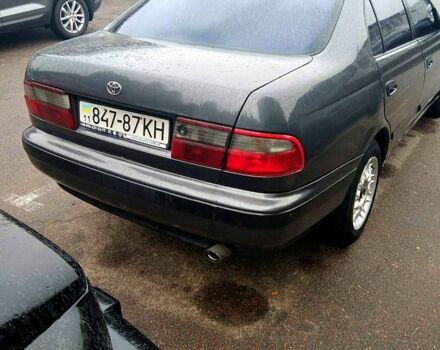 Серый Тойота Карина, объемом двигателя 2 л и пробегом 350 тыс. км за 1300 $, фото 2 на Automoto.ua