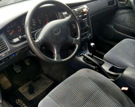 Серый Тойота Карина, объемом двигателя 2 л и пробегом 350 тыс. км за 1300 $, фото 4 на Automoto.ua