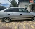 Сірий Тойота Каріна, об'ємом двигуна 1.6 л та пробігом 395 тис. км за 3000 $, фото 1 на Automoto.ua