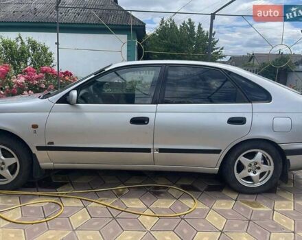Сірий Тойота Каріна, об'ємом двигуна 1.6 л та пробігом 395 тис. км за 3000 $, фото 4 на Automoto.ua