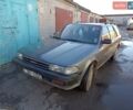 Сірий Тойота Каріна, об'ємом двигуна 1.6 л та пробігом 304 тис. км за 1800 $, фото 1 на Automoto.ua