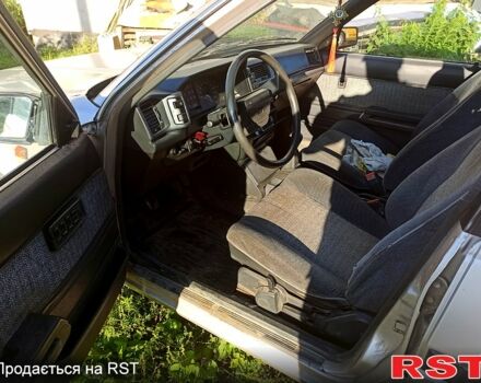 Серый Тойота Карина, объемом двигателя 1.6 л и пробегом 230 тыс. км за 560 $, фото 2 на Automoto.ua