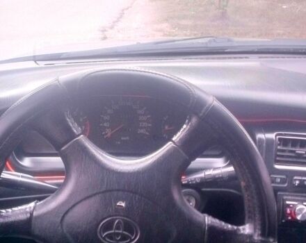 Сірий Тойота Каріна, об'ємом двигуна 2 л та пробігом 0 тис. км за 2000 $, фото 2 на Automoto.ua