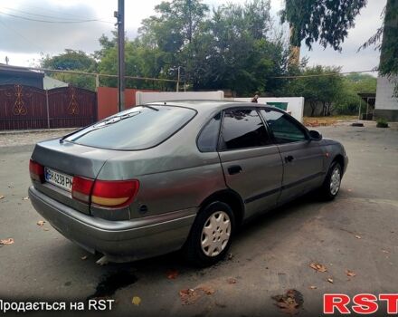 Серый Тойота Карина, объемом двигателя 1.6 л и пробегом 0 тыс. км за 1250 $, фото 1 на Automoto.ua