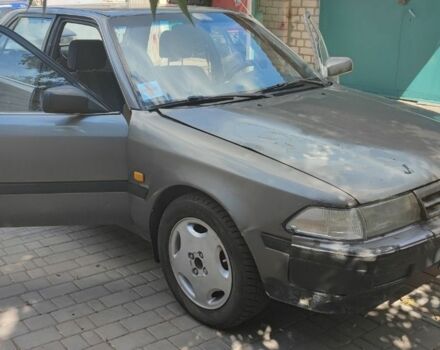 Серый Тойота Карина, объемом двигателя 1.6 л и пробегом 370 тыс. км за 952 $, фото 1 на Automoto.ua