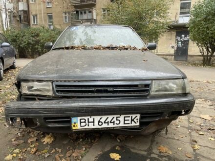 Серый Тойота Карина, объемом двигателя 1.6 л и пробегом 180 тыс. км за 700 $, фото 1 на Automoto.ua