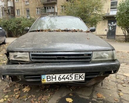 Серый Тойота Карина, объемом двигателя 1.6 л и пробегом 180 тыс. км за 700 $, фото 1 на Automoto.ua