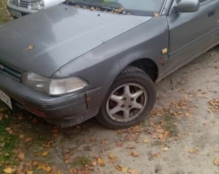 Серый Тойота Карина, объемом двигателя 1.6 л и пробегом 100 тыс. км за 700 $, фото 1 на Automoto.ua