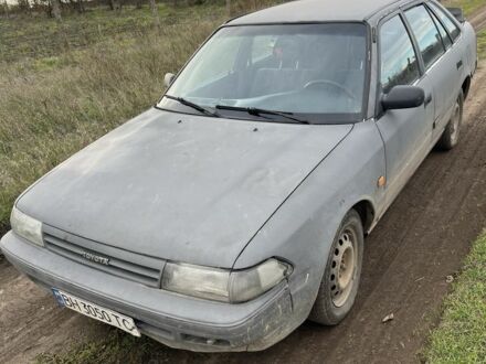 Серый Тойота Карина, объемом двигателя 1.6 л и пробегом 220 тыс. км за 1300 $, фото 1 на Automoto.ua