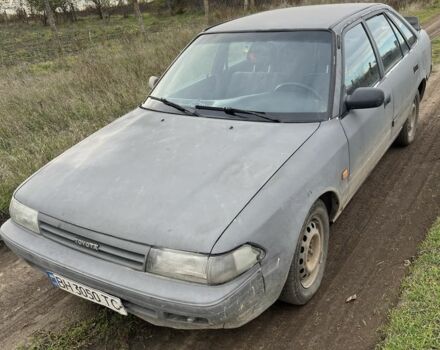 Серый Тойота Карина, объемом двигателя 1.6 л и пробегом 220 тыс. км за 1300 $, фото 1 на Automoto.ua