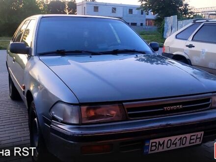 Сірий Тойота Каріна, об'ємом двигуна 2 л та пробігом 280 тис. км за 1700 $, фото 1 на Automoto.ua