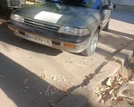 Серый Тойота Карина, объемом двигателя 2 л и пробегом 320 тыс. км за 954 $, фото 1 на Automoto.ua