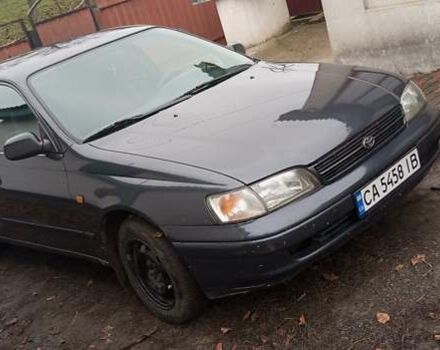 Серый Тойота Карина, объемом двигателя 2 л и пробегом 404 тыс. км за 2999 $, фото 1 на Automoto.ua