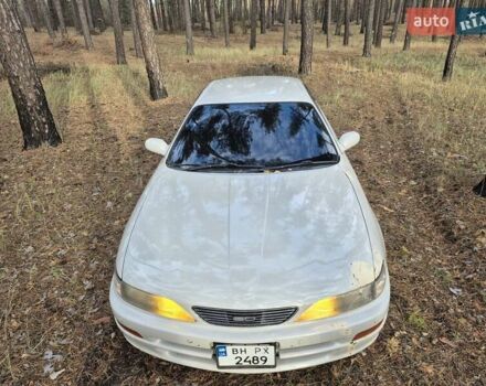 Серый Тойота Карина, объемом двигателя 2 л и пробегом 304 тыс. км за 3000 $, фото 1 на Automoto.ua