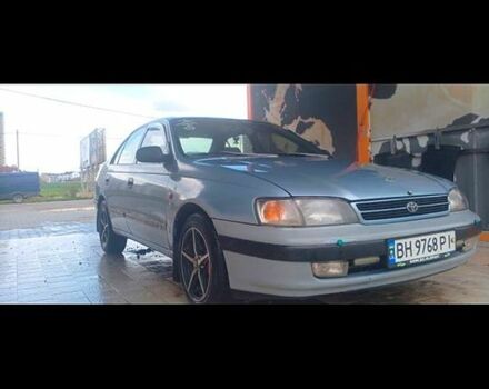 Серый Тойота Карина, объемом двигателя 1.6 л и пробегом 395 тыс. км за 2500 $, фото 1 на Automoto.ua