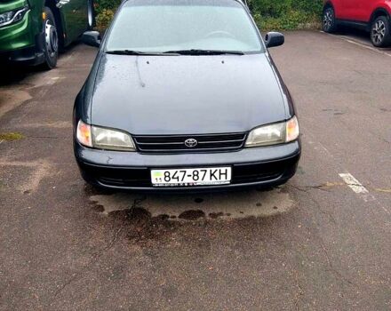 Серый Тойота Карина, объемом двигателя 2 л и пробегом 350 тыс. км за 1300 $, фото 1 на Automoto.ua