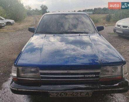 Синий Тойота Карина, объемом двигателя 2 л и пробегом 250 тыс. км за 900 $, фото 3 на Automoto.ua