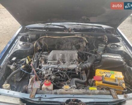 Синий Тойота Карина, объемом двигателя 2 л и пробегом 250 тыс. км за 900 $, фото 4 на Automoto.ua