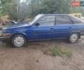 Синий Тойота Карина, объемом двигателя 2 л и пробегом 250 тыс. км за 900 $, фото 1 на Automoto.ua