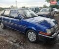 Синий Тойота Карина, объемом двигателя 2 л и пробегом 250 тыс. км за 900 $, фото 2 на Automoto.ua