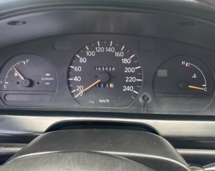 Синий Тойота Карина, объемом двигателя 1.59 л и пробегом 368 тыс. км за 2300 $, фото 1 на Automoto.ua