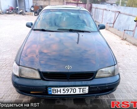 Синій Тойота Каріна, об'ємом двигуна 2 л та пробігом 200 тис. км за 1600 $, фото 2 на Automoto.ua