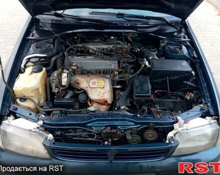 Синій Тойота Каріна, об'ємом двигуна 2 л та пробігом 200 тис. км за 1600 $, фото 8 на Automoto.ua