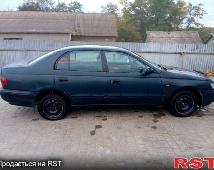Синій Тойота Каріна, об'ємом двигуна 2 л та пробігом 200 тис. км за 1600 $, фото 7 на Automoto.ua