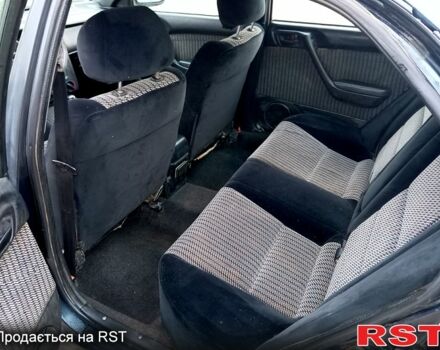 Синій Тойота Каріна, об'ємом двигуна 2 л та пробігом 200 тис. км за 1600 $, фото 12 на Automoto.ua