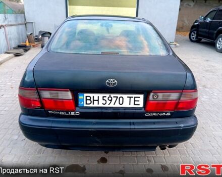 Синій Тойота Каріна, об'ємом двигуна 2 л та пробігом 200 тис. км за 1600 $, фото 3 на Automoto.ua
