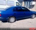 Синій Тойота Каріна, об'ємом двигуна 1.6 л та пробігом 225 тис. км за 2000 $, фото 2 на Automoto.ua