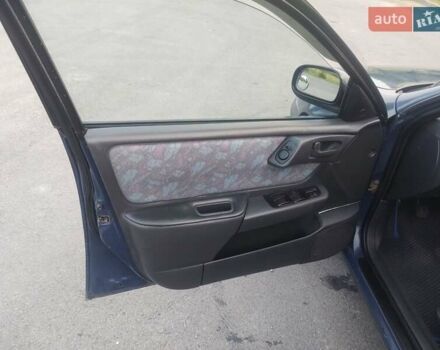 Синий Тойота Карина, объемом двигателя 2 л и пробегом 411 тыс. км за 3150 $, фото 10 на Automoto.ua