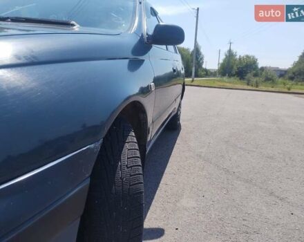 Синий Тойота Карина, объемом двигателя 2 л и пробегом 411 тыс. км за 3150 $, фото 8 на Automoto.ua