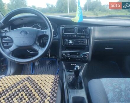 Синий Тойота Карина, объемом двигателя 2 л и пробегом 411 тыс. км за 3150 $, фото 14 на Automoto.ua