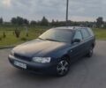 Синий Тойота Карина, объемом двигателя 2 л и пробегом 411 тыс. км за 3150 $, фото 1 на Automoto.ua