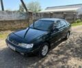 Синий Тойота Карина, объемом двигателя 1.6 л и пробегом 300 тыс. км за 1999 $, фото 1 на Automoto.ua